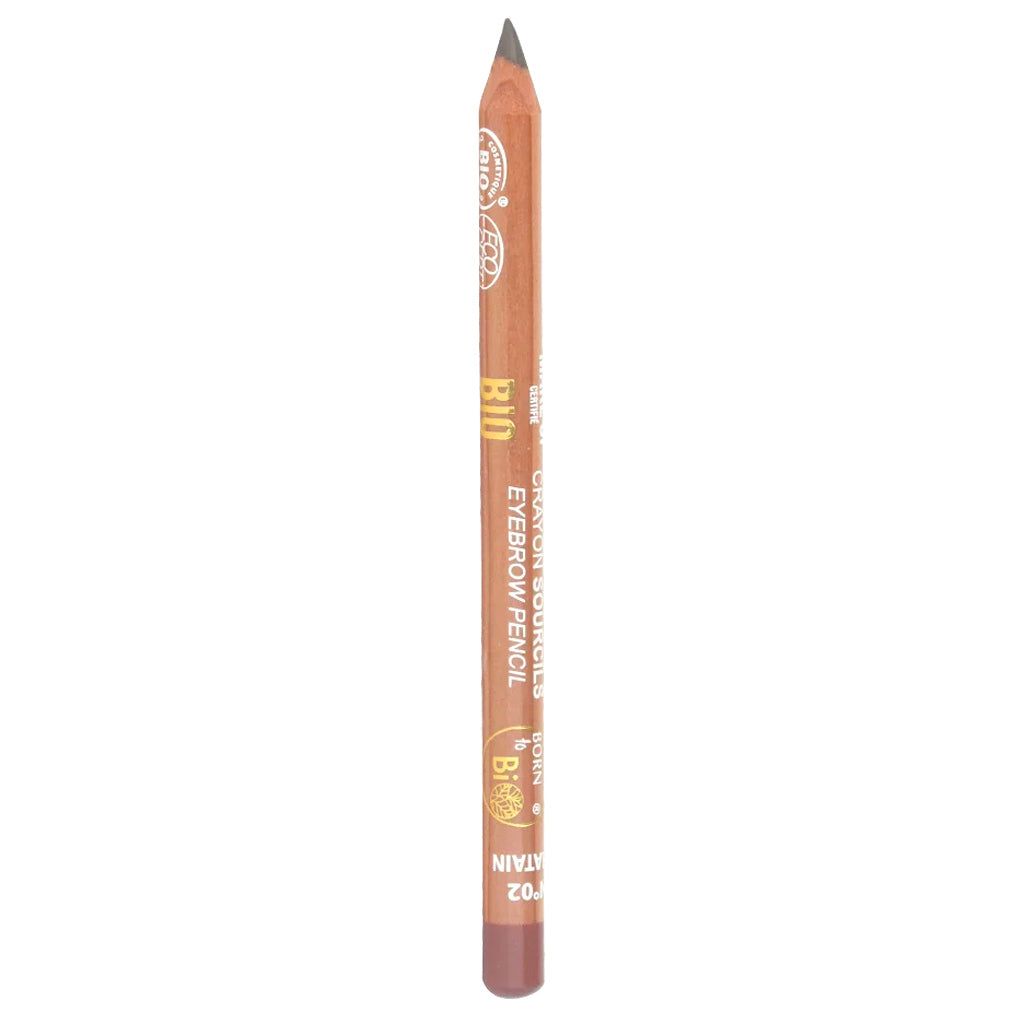 A brown eyebrow pencil with a pointed tip, featuring gold and white text on the side, is showcased against a white background. The pencil appears cylindrical with a matte finish and no visible packaging. Text on the barrel uses a clear sans-serif font. No people or hands are present in this straightforward product shot.