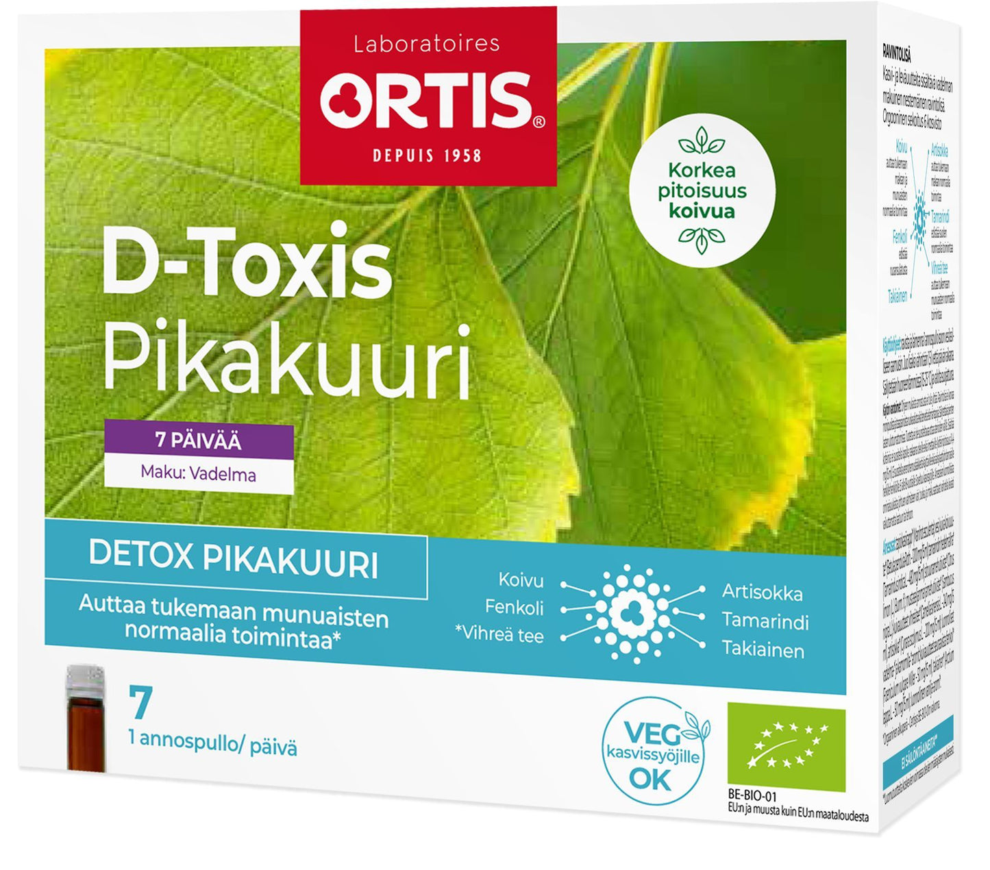 D-Toxis Detox pikakuuri vadelma; suorakulmainen, mattapintainen ja pääosin valkoinen-vaaleanpunainen pahvipakkaus vihrein korostuksin ja lehtikuvituksin, vegaani- ja kasviperäisyyskuvakkeet; lihavoitu groteskiteksti tuotenimestä; kertoo 7 päivän vadelmanmakuisesta detox-kuurista, joka tukee munuaisten toimintaa; neutraali tausta.