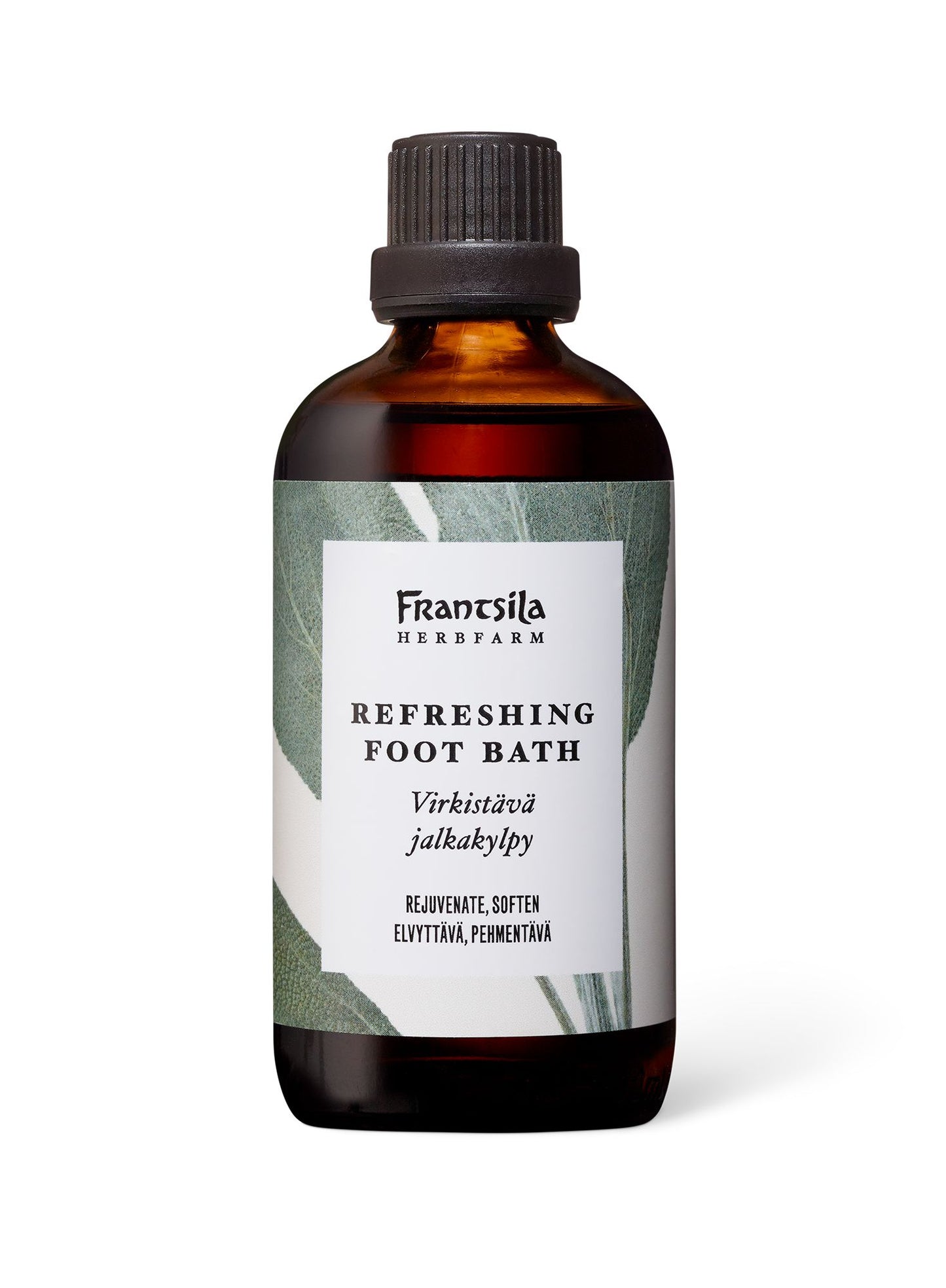 A brown bottle labeled Frantsila Herb Farm Refreshing Foot Bath with text in English and Finnish, featuring a green leaf design on the label and botanically inspired accents, set against a plain white background. The bottle is made of opaque brown material with a cylindrical shape and glossy finish. Label typography is clear, sans-serif for main product name, all legible. No people or additional objects in the image. The photo is taken head-on with even lighting.