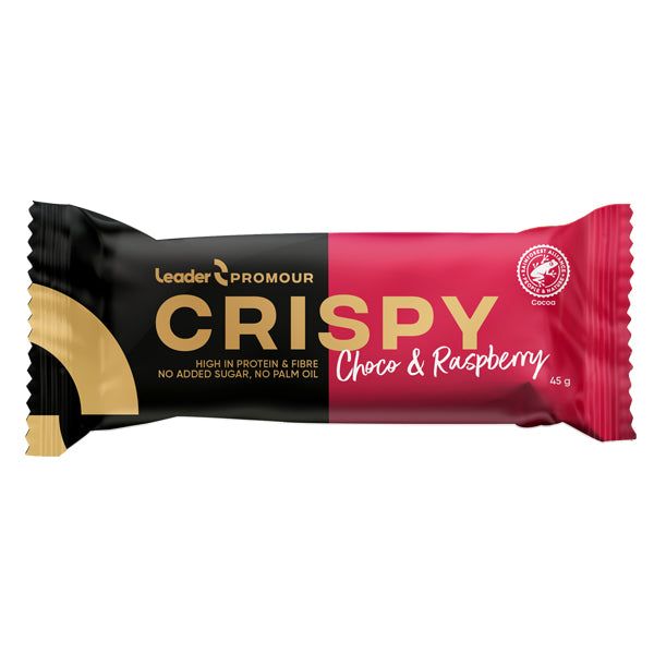A protein bar in black, gold, and red packaging labeled Leader Promour Crispy Choco & Raspberry, featuring product details, a cocoa certification logo, and high-protein content. Rectangular wrapper with glossy finish. Sans-serif type in bold white for main label and smaller gold text for product details. Packaging features visible logos; set against a plain background with no people or hands present.