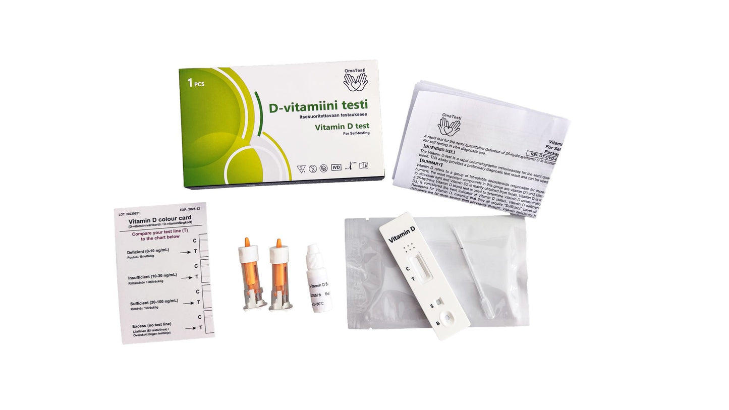 Vitamin D home test kit featuring a green and white box, two orange-tipped plastic lancets, several white paper instruction sheets with black printed text, a small rectangular test strip, a transparent dropper, and a Vitamin D colour card. All items have a matte finish and are arranged neatly on a plain white background. Box shows sans-serif label text. No people or hands visible.