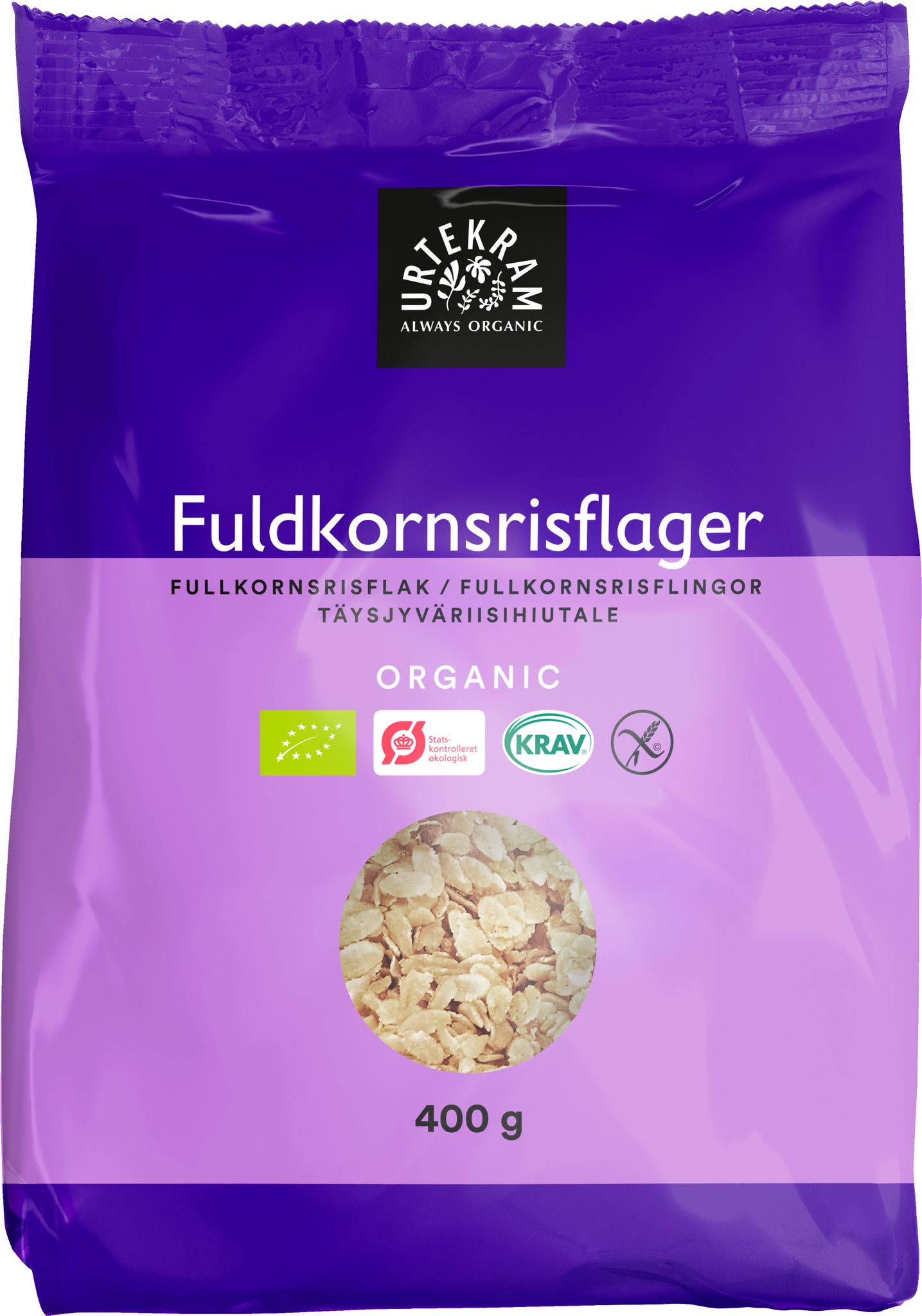 A purple 400g package of Urtekram organic whole grain rice flakes, featuring certifications and a clear window displaying the wholesome flakes inside. The package is rectangular with a matte finish. Sans-serif white and black typography displays the brand name, product description, and weight. Certification logos are present on the front. Product is photographed against a plain background with no people or hands visible.