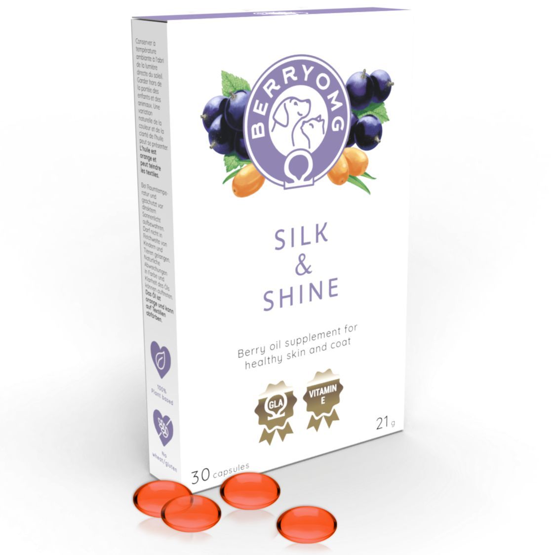 Berry OMG Silk & Shine; pääosin valkoinen, kiiltäväpintainen ja suorakulmainen pakkaus violetein ja oranssein yksityiskohdin, jossa violetteja marjoja ja oranssia tyrniä; edessä viisi soikeaa, sileäpintaista oranssia kapselia; lihavoitu groteskiteksti "Silk & Shine" kertoo antioksidanttipitoisista ainesosista iholle ja turkille.