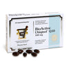 Box of BioActive Ubiquinol Q10 100 mg capsules by Pharma Nord with six brown, glossy, oval capsules in front. The rectangular box is mainly white with black and gold accents, and has legible Finnish and Swedish product text. There is a round gold emblem on the front. Serif typography is used for the main text. Plain white studio background. No people or hands visible in the image.