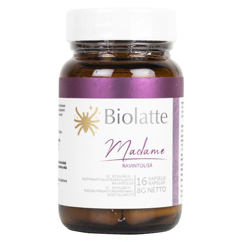 A brown, cylindrical plastic bottle with a matte finish, white screw-on cap, and purple label accents stands upright. Label reads Biolatte Madame, 16 probiotic capsules, 8g netto. Serif and sans-serif fonts used on the label. No people or hands present. Plain white background. Close-up product shot.