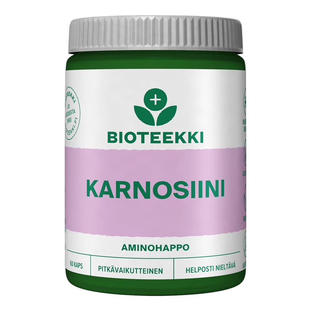 Bioteekki Karnosiini; vihreä-valkoinen purkki tekstillä "BIOTEEKKI KARNOSIINI" violetilla nauhalla, sisältää 60 kapselia; muovipurkki mattapinnalla, lieriön muotoinen kierrekorkillinen; etiketti lihavoitua sans-serif-tekstiä lohkokirjaimin eri fonttipainoin; pääteksti sisältää "AMINOHAPPO", "PITKÄVAIKUTTEINEN" ja "HELPPOSTI NIELTÄVÄ" aminohappokaavasta; kuvattu valkoista taustaa vasten, ei ihmisiä tai toimintaa näkyvissä.