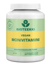 A white plastic bottle with a cylindrical shape and a screw-on cap, matte surface finish. The bottle has green and yellow accents on the label. Typography is modern sans-serif; main text reads “Bioteekki Vegan Monivitamiini,” other information includes “90 tablets.” No people or hands are visible. Plain background, likely studio shot. A white bottle labeled Bioteekki Vegan Monivitamiini with green and yellow accents, containing 90 tablets of vegan multivitamins to support a plant-based lifestyle.