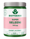 A green and white Bioteekki Super Seleeni supplement bottle, labeled 100 µg, with a pink stripe and text in Finnish, containing 120 seleeni tablets. Plastic cylindrical bottle with a white screw cap, mostly matte finish. Label features sans-serif type in black and pink. Background is plain white; there are no people or other objects visible. Shot is taken from the front at eye level.