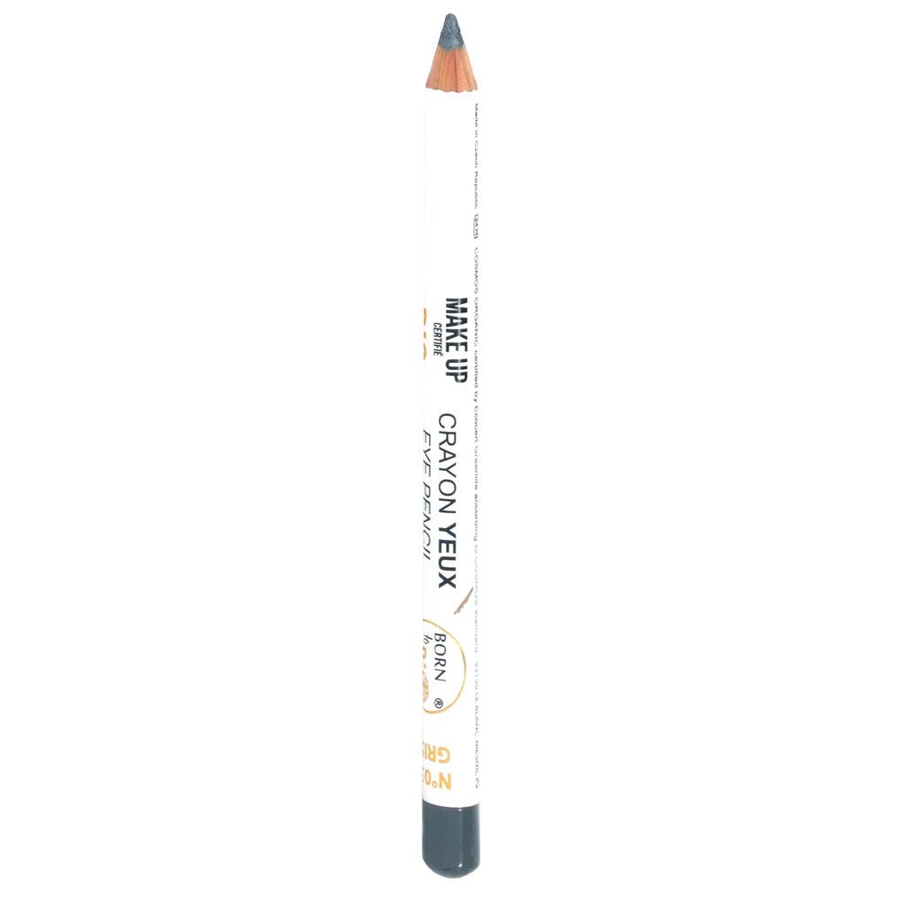 Valkoinen silmäkynä sinisellä kärjellä seisoo pystyssä valkoisella taustalla; lieriömäinen muoto, sileä viimeistely; päätekstissä lukee Make Up Crayon Yeux Eye Pencil sekä lisäksi mustaa ja kultaista tekstiä; ei näkyvää pakkausta tuotteen lisäksi; ei ihmisiä tai käsiä kuvassa; studiotuotekuva neutraalilla valaistuksella.