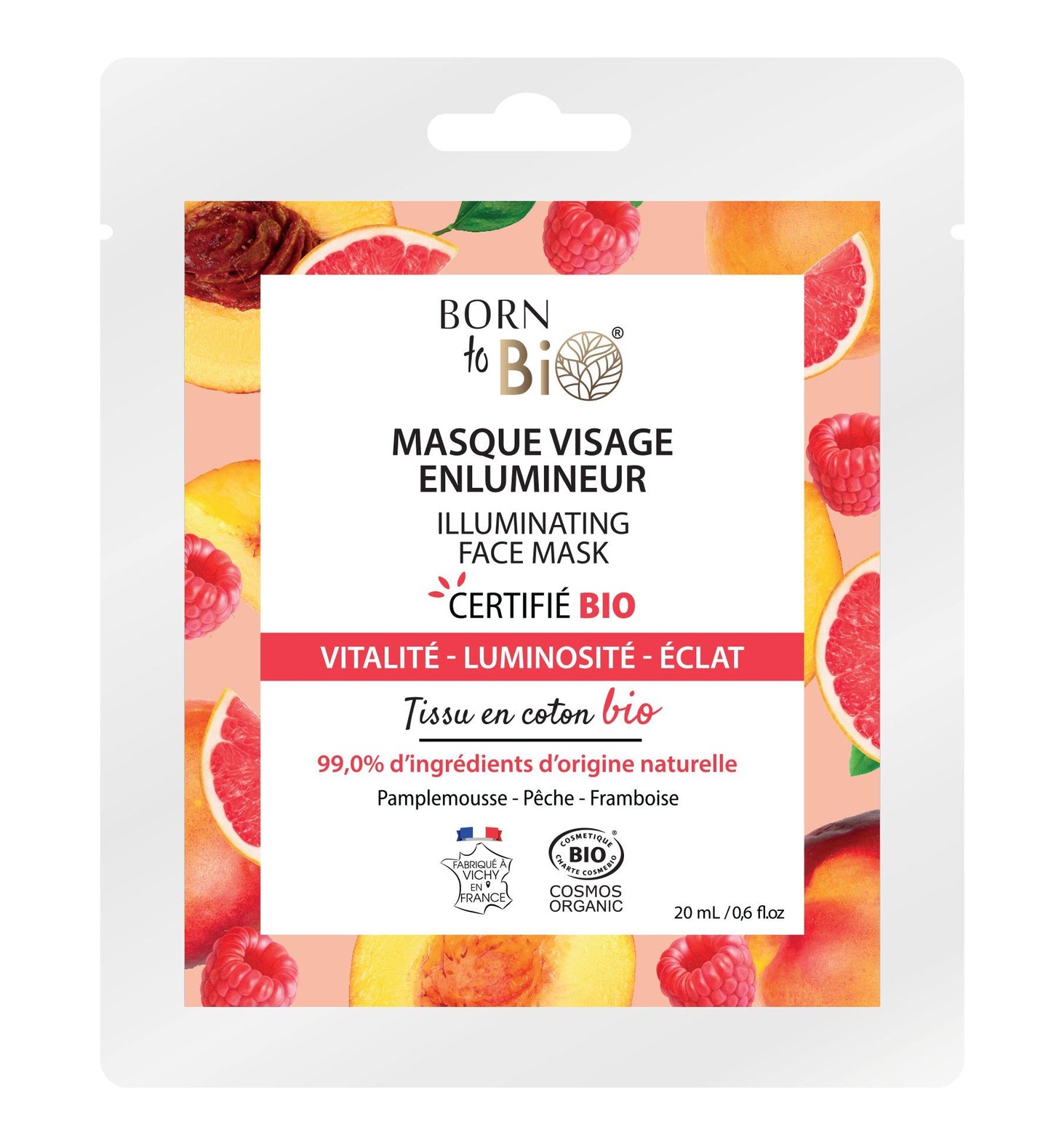A packet of Born to Bio Illuminating Face Mask featuring images of grapefruit, peach, and raspberry is shown. The packet is rectangular with a glossy surface finish and displays a multicolored background. Product name appears in bold, rounded lettering at the top. Other visible text indicates organic ingredients. No people or hands are present in the image.