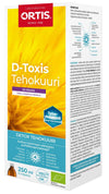 D-Toxis Detox tehokuuri vadelma; suorakulmainen, mattapintainen ja valkoinen-vihreä pahvipakkaus kasvikuvituksin; lihavoitu groteskiteksti tuotenimestä ja pienempi teksti ainesosista, käyttöohjeista ja terveystiedoista suomeksi; neutraali studiotausta.