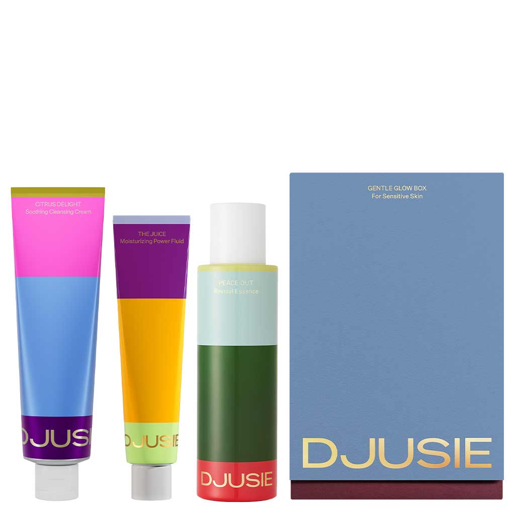 Djusie Gentle Glow Box – puhdistusvoide, hoitoneste ja tehokosteuttaja sinisen lahjakotelon vieressä