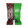 A green and black bag labeled Energy Candies with Hartsport and Salmiakki Salmiak. The package features a geometric red and black pattern, matte finish, rectangular shape, and clear plastic window showing dark oval candies in the center. Text is bold sans-serif in white, set horizontally. Plain white background, no people or hands present, product shown front-facing at eye level.