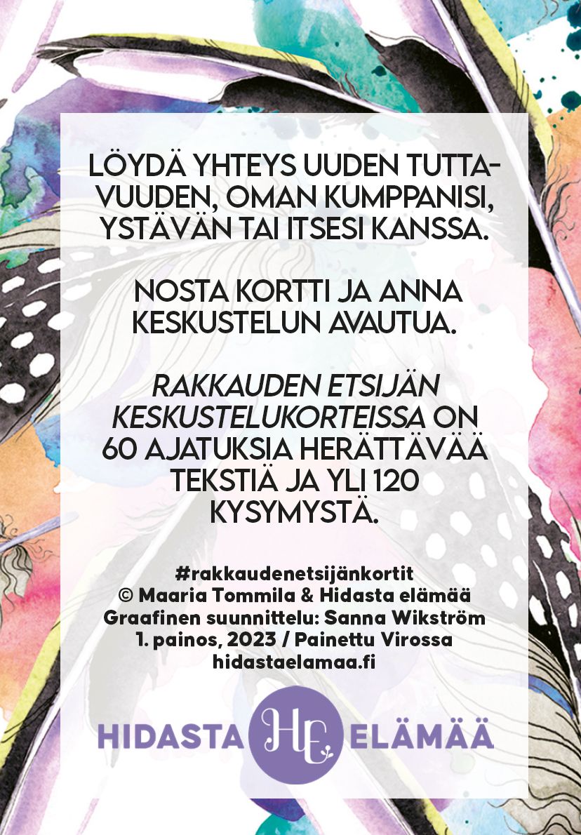 A Finnish text card featuring watercolor flowers and feathers. Rectangular, made of matte white card stock with multicolored floral and feather designs framing centered black sans-serif Finnish text. Smaller publication and creator details are printed at the bottom. Product is unboxed, photographed against a plain light background with no hands or people visible.