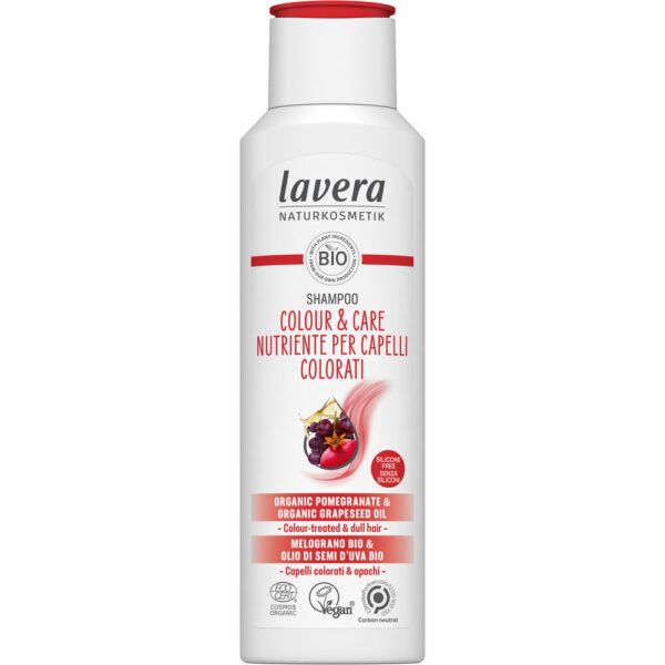 A white plastic bottle of Lavera Colour & Care Shampoo for color-treated hair, cylindrical with a rounded shoulder and matching cap. The surface is matte. Label text is in English and Italian. There is a vibrant fruit graphic showing pomegranate and grapes on the front label. The typography is clear sans-serif. Plain background, product only—no people or hands. Straight-on product shot.