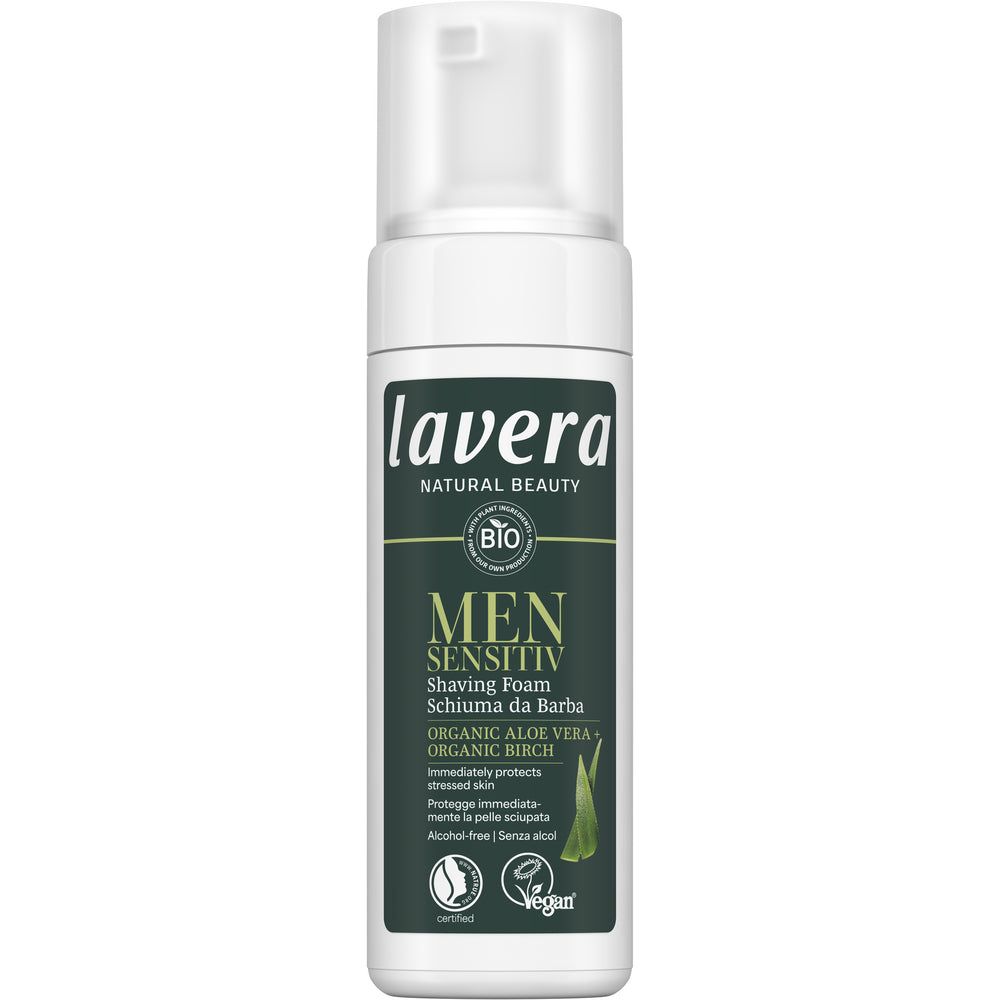 Lavera Men Sensitiv Shaving Foam bottle with a white top and dark green label, featuring organic aloe vera and birch, indicated as vegan and alcohol-free. Cylindrical plastic bottle with matte finish. Label includes legible product name and icons for vegan, alcohol-free. No people or hands visible. Plain background. Standard upright product shot.