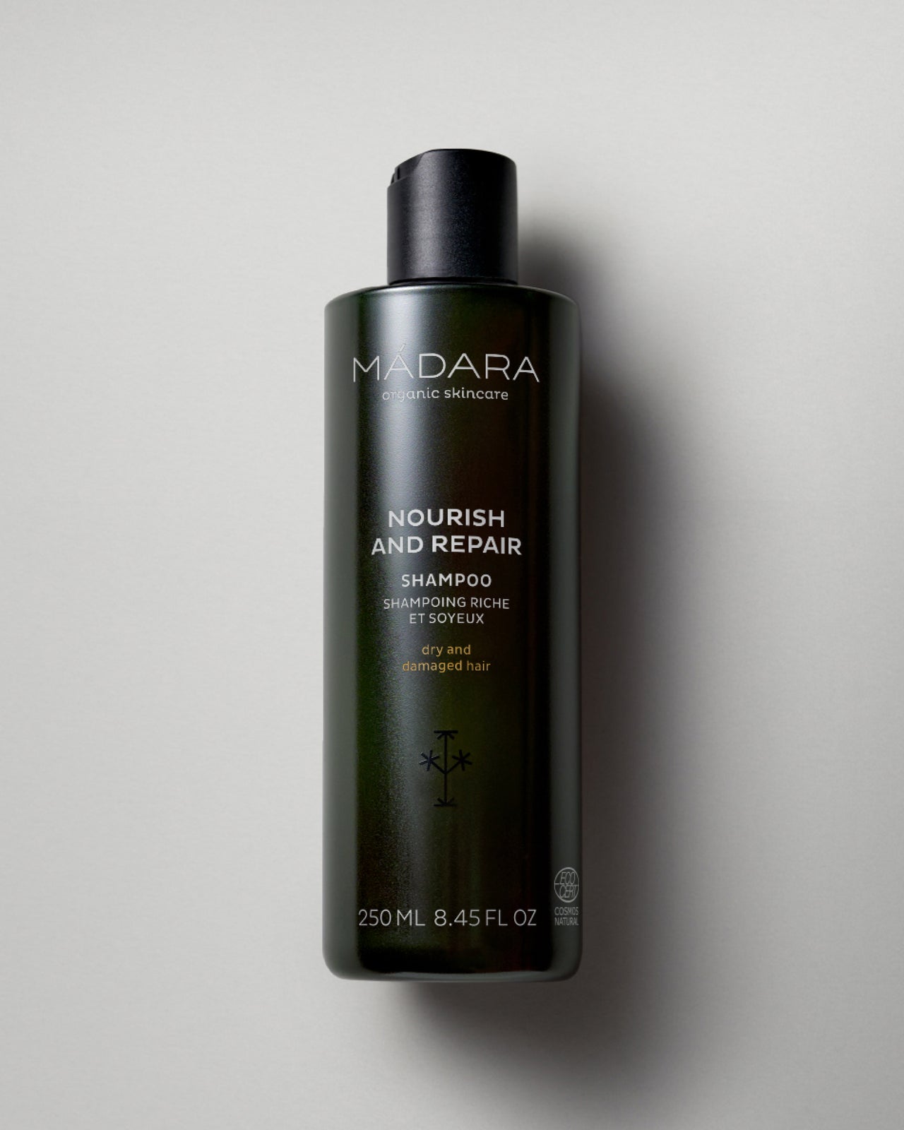 Madara Ravitseva ja korjaava shampoo 250 ml tummanvihreässä pullossa