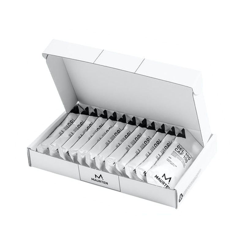 Open white box containing multiple Maurten GEL 100 energy gel packets arranged in a row, with distinctive black and white packaging and innovative hydrogel technology visible. Box is rectangular and made of matte white cardboard. Packets are narrow, flexible pouches with matte surfaces, showing bold sans-serif labeling in white on black. Background is plain and light-colored; no people or hands present. Shot is front-facing at slight overhead angle.