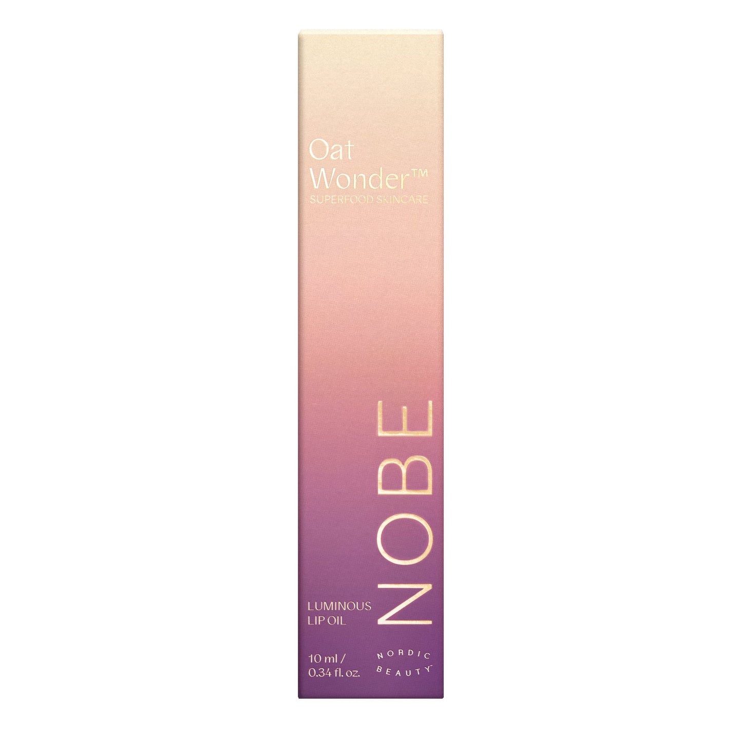 A tall, rectangular box for NOBE Oat Wonder Luminous Lip Oil features a vertical gradient, shifting from light beige at the top to a deep purple at the bottom, with gold-toned text throughout. The box is made of matte-finish cardboard and has sharp edges. “NOBE” is printed vertically in sans-serif font. Oat imagery and product details are included on the front. No people or hands are visible; plain background; studio shot.