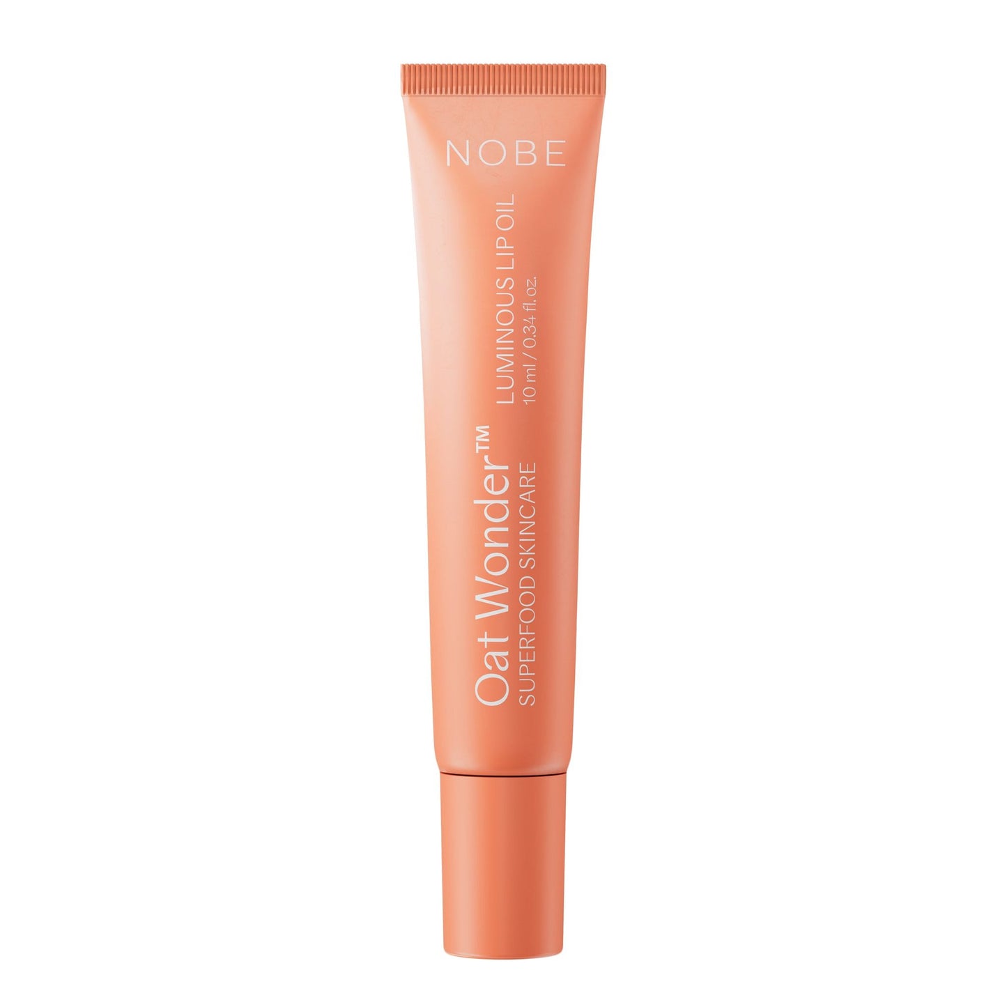 A peach-colored tube of NOBE Oat Wonder Superfood Skincare Luminous Lipoil, infused with oat extract, 10 ml/0.34 fl.oz., standing upright against a white background. The tube is made of plastic with a matte finish and has cylindrical shape with a tapered cap. Product and branding text is printed vertically in straightforward sans-serif font in white and orange. No people or props visible; centered product shot on plain background.