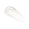 A close-up of a clear, glossy serum or gel smear on a white background, highlighting its smooth texture and slight transparency. No packaging, labels, or typography are visible. The product has an amorphous shape with rounded edges and a lustrous surface. No people or hands are included in the shot.