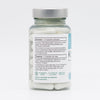A clear cylindrical plastic bottle of white capsules with a silver screw-on lid. The label is matte and wrapped around the bottle, displaying dosage instructions, ingredients, and icons for vegan, gluten-free, and lactose-free. Text appears in Finnish and Swedish using simple sans-serif fonts. The image background is plain white with no visible people or actions.