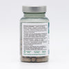 A clear plastic bottle containing herbal supplement capsules, with a cylindrical shape and flat white screw cap. The surface is glossy. The white label features black and green sans-serif text listing ingredients and dosage instructions in both Finnish and Swedish, plus vegan, gluten-free, and dairy-free icons. The product sits on a neutral background. A clear bottle of herbal supplement capsules with a white label listing ingredients and dosage instructions in Finnish and Swedish. The label also displays