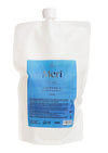 A white refill pouch with a blue label reading Meri Aava Shampoo & Suihkugeeli 1000 ml. The pouch is rectangular with rounded edges and a white screw cap on top. Surface is matte. Minimal graphics show bird and wave icons in blue. Label uses simple sans-serif typography. Set against a plain background, no people visible, standard product shot angle.