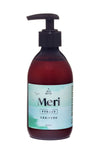 A brown plastic pump bottle with a matte finish, cylindrical shape, and a light blue-green rectangular label on the front. The label includes minimalistic illustrations of seagulls and waves, simple sans-serif font for “Meri,” and additional product text in smaller lettering. No people or hands are present. The background is plain white.