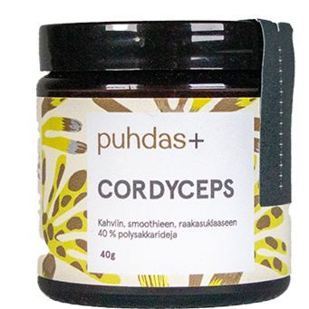 Puhdas+ Cordyceps; ruskea mattapintainen purkki kierrekannella, etiketissä teksti "puhdas+ Cordyceps", keltais-vihreitä abstrakteja kuvioita ja suomenkielistä tekstiä; astia lieriön muotoinen siistein reunoin; etikettitypografia yksinkertaisella sans-serif-fontilla; ei ihmisiä tai käsiä; valkoinen tausta, suoraviivainen tuotekuva.