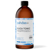 A brown plastic bottle with a matte finish, cylindrical shape, and blue accents on the label. The label uses bold sans-serif typography. Visible text: puhdas+ SILICA TONIC PIIHAPPOGEELI 500 ml, gluten-free, lactose-free, vegan, enriched with silica. No people or hands present. Neutral background with even lighting.