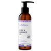 A brown plastic pump bottle labeled puhdas+ BODY & MASSAGE OIL with a lavender motif on the label. Label text includes Relaxing Lavender, 100% Natural & Vegan, and Pure Beauty Born in Finland in sans-serif type. Matte finish bottle, rounded shape. Shot is of the product only against a plain background. No people or hands visible. A brown pump bottle labeled puhdas+ BODY & MASSAGE OIL with a lavender-themed design. Text highlights Relaxing Lavender, 100% Natural & Vegan, and Pure Beauty Born in Finland.