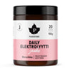 A jar labeled Puhdistamo Daily Elektrolyytti jauhe with a pink band, containing 100g (20 servings) of strawberry flavor (Mansikka) electrolyte powder, designed for daily use. The container is cylindrical and white with a matte finish, topped by a white screw cap. The label features bold black and white text with some information in pink. No people or hands are visible. The background is plain white and the image is a product shot taken from the front.