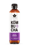 A bottle of Puhdistamo Luomu Kombucha, Goji & Passion flavor, features a vibrant purple label and a black cap. The bottle is cylindrical and made of clear glass, showing the pale amber liquid inside. The label includes white sans-serif text with product name and volume visible. The surface finish is glossy. Background is plain white with no additional props or people present.