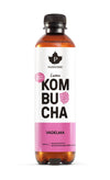 A bottle of Puhdistamo Luomu Kombucha Vadelma with a white and pink label, featuring a vibrant raspberry graphic and bold black text. The bottle is clear glass with a smooth, glossy surface and a cylindrical shape. The label shows the product name and flavor. The background is plain white, shot is front-facing, no people or hands visible. The 400 ml bottle contains organic, raspberry-flavored kombucha.