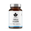 A brown glass bottle labeled Puhdistamo Tripla Seleeni with 60 capsules, each containing 100 µg of selenium. The cylindrical bottle has a white screw cap and a matte white label featuring black sans-serif text and minimalist graphic accents. The label, written in Finnish, highlights benefits for immunity, hair, and nails. The background is neutral; no people or hands are visible.