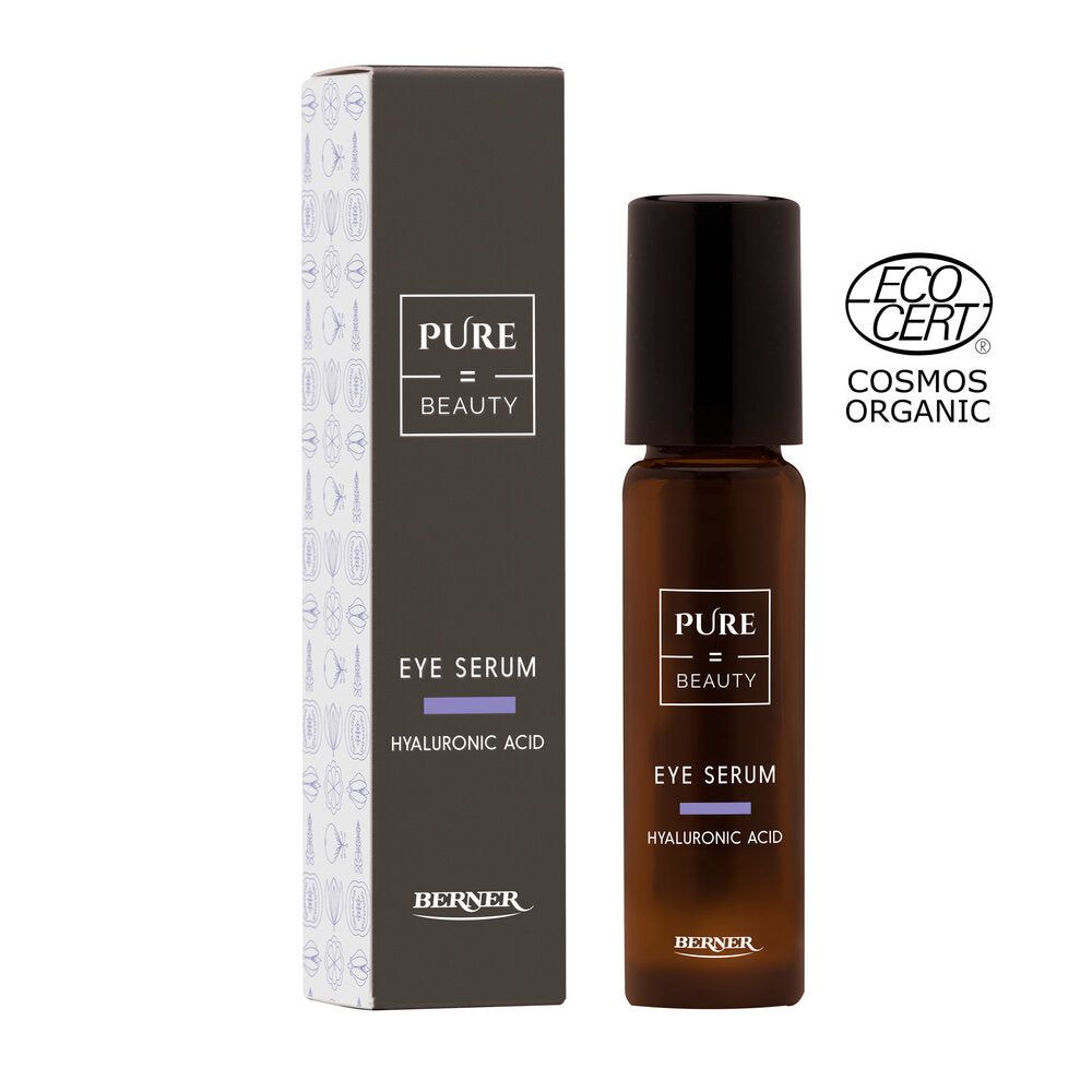Brown bottle and box of PURE Beauty Eye Serum with hyaluronic acid by Berner, featuring an ECOCERT Cosmos Organic certification logo on a white background and highlighting its organic formulation. The bottle has a matte brown finish and cylindrical shape, while the box is rectangular with clean typography; both display product name, key ingredient, brand, certification badge. No people or hands present.