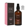 Amber bottle of Pure Beauty Castor Oil with a pump, next to a pink rectangular box. Box and bottle display minimal black sans-serif text. The ECOCERT Cosmos Organic certification logo is in the top right corner. Plain background, well-lit studio shot. No people or hands are visible in the image.