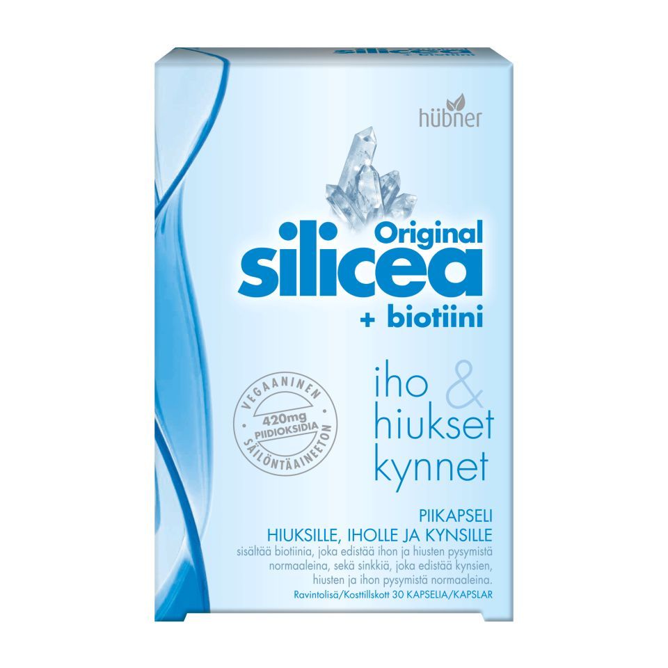 Silicea Original + Biotiini kapseli: rasia Silicea Original + Biotin -ravintolisää suomeksi, sinistä tekstiä, kristallikuvitus ja tietoa biotiinin hyödyistä iholle, hiuksille ja kynsille; rasia sisältää 30 kapselia; suorakulmainen kartonkipakkaus mattapinnalla; pohjaväri valkoinen sinisin korostuksin; lihavoitu groteskikirjasin etuosassa; ei ihmisiä tai käsiä näkyvissä, neutraali tausta, suoraan edestä otettu tuotekuva.