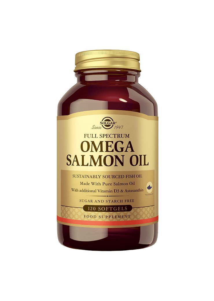 A brown bottle of Solgar Full Spectrum Omega Salmon Oil softgels with a gold label. The bottle has a cylindrical shape with a black screw cap and glossy finish. Serif and sans-serif text in black is clearly printed on the metallic gold label. The label states product name, fish oil source, Vitamin D3, sugar/starch free formula, and 120-count. Product photographed against plain background; no people or hands visible.