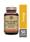 A bottle of Solgar No-Flush Niacin 500 mg capsules with gold and tan matte labeling, dark brown glass, and cylindrical shape is positioned upright. Next to it are a small rectangular yellow box labeled “Energy” in black sans-serif text and a gray box reading “50 capsules.” The items are set against a plain, light background in a product shot.