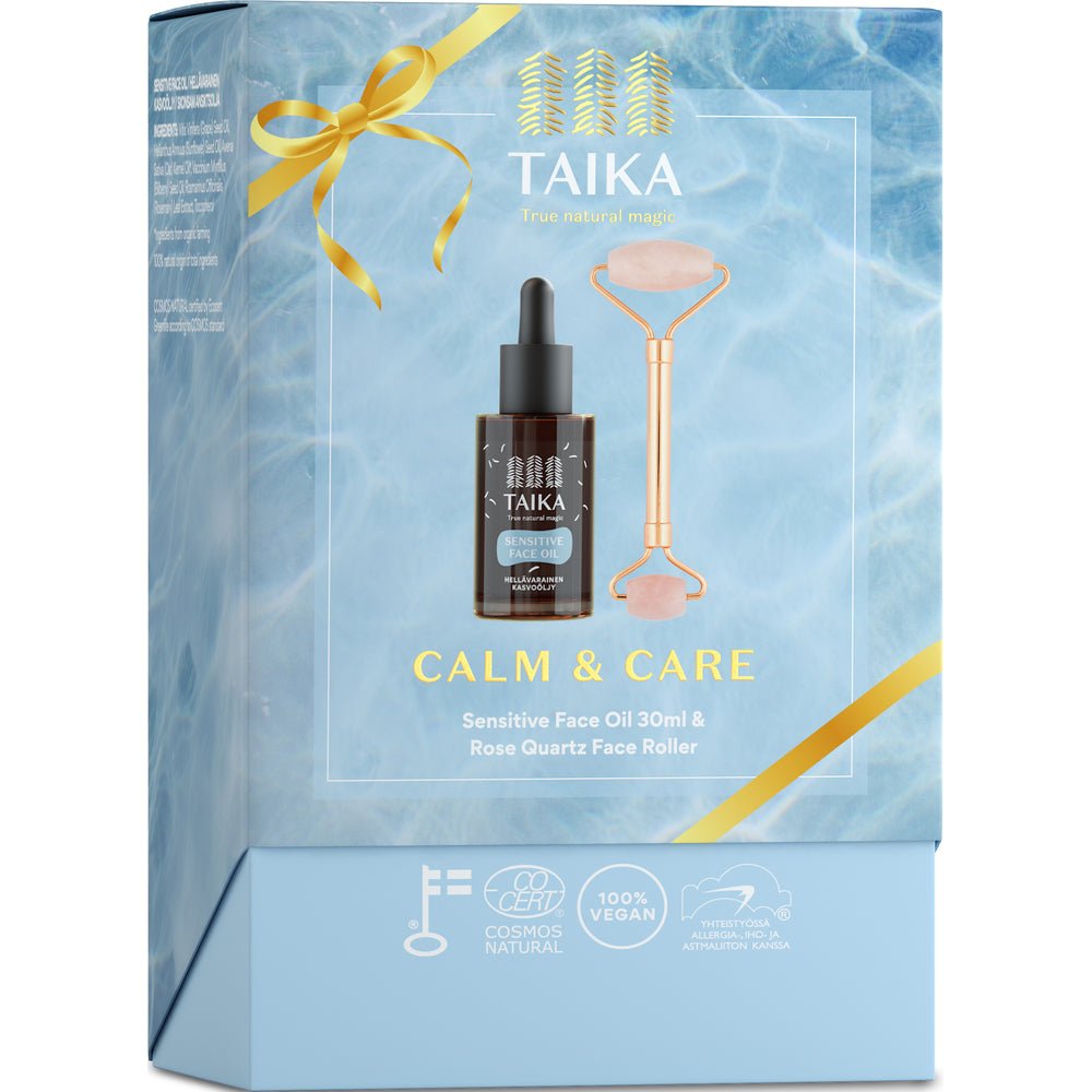 Taika Calm & Care -joululahjarasia jäänsinisin sävyin ja kultaisella rusetilla