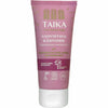 A pink tube of Taika hand cream labeled “Vahvistava Käsivoide for aging skin” is shown, made of soft matte plastic with a screw cap. The label includes icons for vegan, cruelty-free, no microplastics, and Cosmos Natural certification. Typography is white and sans serif. The background is plain white. No people or hands are present in the shot.