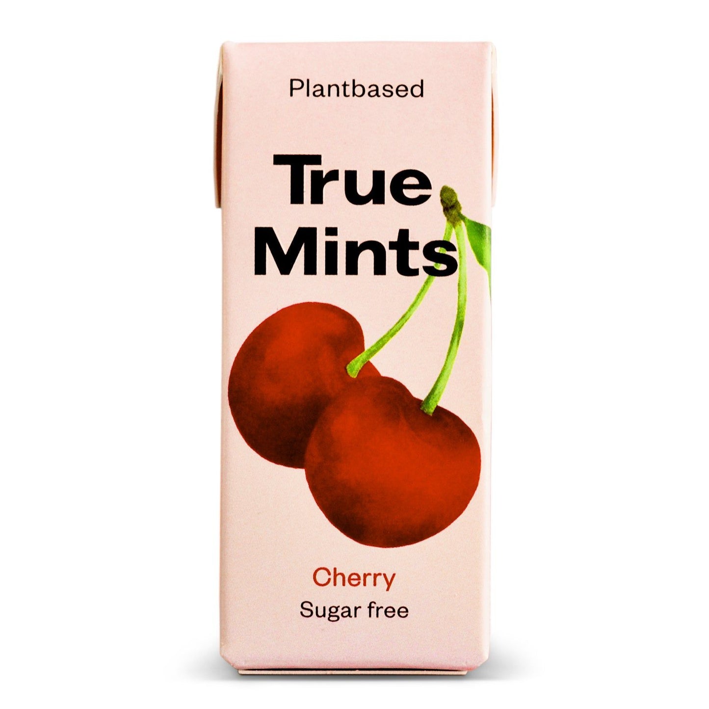 A pink rectangular box labeled “Plantbased True Mints” with sans-serif white and red text is shown. The front displays two illustrated red cherries with green stems. Additional visible text notes the mints are sugar free and cherry-flavored. The surface appears matte, and no people or background details are visible.