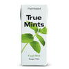 A white box labeled True Mints with Plantbased at the top and Fresh Mint, Sugar free at the bottom, featuring a green mint leaf graphic on the front. Rectangular box with matte finish. Text uses sans-serif fonts, mostly uppercase. No people or hands visible. Plain or neutral background; front-facing product shot. This plantbased box highlights a fresh mint flavor in a sugar free formula.