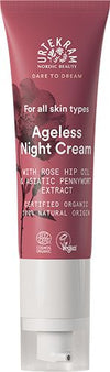 A tube of Urtekram Ageless Night Cream with rose hip oil and pennywort extract, formulated for all skin types, organic, vegan, and nourishing, set against a white background. The tube is upright, medium height, cylindrical with a smooth matte finish and pastel lavender color. Legible label text appears in simple sans-serif font centered on the front. No people or additional objects are present.
