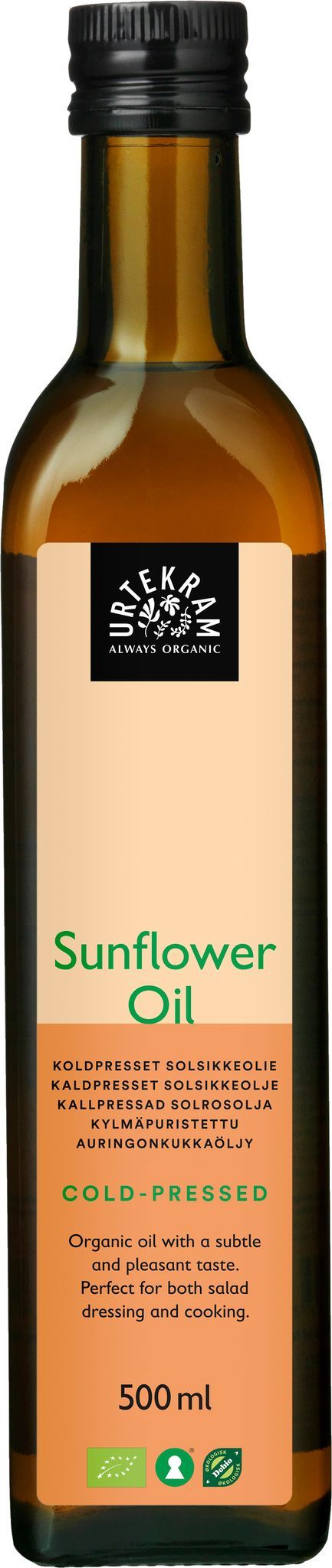 Urtekram Luomu Auringonkukkaöljy; ruskea lasipullo Änglamark-luomuauringonkukkaöljyä vihreä-beigellä etiketillä, tekstissä ”Always Organic”, monikielinen kuvaus ja 500 ml tilavuus; etiketin pinta matta groteskikirjasimella; pullo sylinterin muotoinen metallikorkilla; valkoinen tausta, ei ihmisiä tai käsiä.