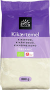 Urtekram Luomu Kikhernejauho; 300 gramman pussi Urtekram-luomukikhernejauhoa violetilla mattaetiketillä, selkeä monikielinen teksti ja luomusertifiointilogo; pakkaus suorakulmainen ja paperinen; tuotenimi lihavoidulla groteskikirjasimella, pienempi teksti alla; pussi pystyssä vaalealla taustalla; ei ihmisiä tai käsiä näkyvissä.
