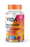 A bottle of VIDA Monivitamiininalle vitamins with berry and orange flavors, featuring cartoon bears and colorful gummies on the white plastic label. The label is mostly white with multicolored accents, matte finish, cylinder shape, screw cap. Large bold sans-serif Finnish text is visible. Studio-lit on a plain background. 120 count stated.