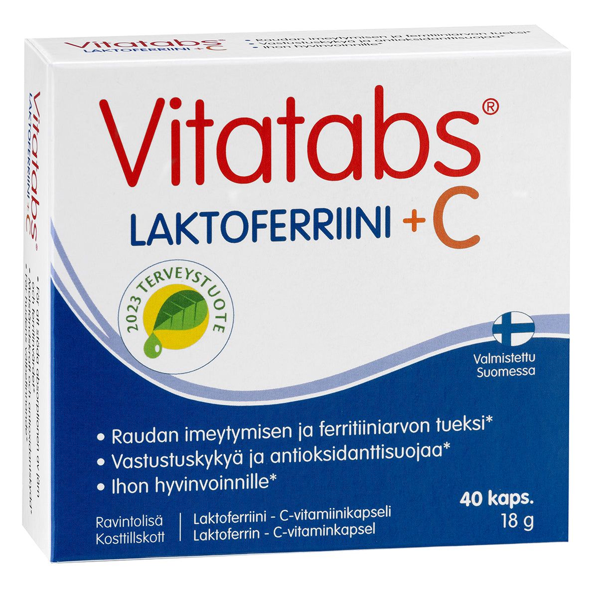Vitatabs Laktoferriini 177 mg + C; laatikko Vitatabs Laktoferriini + C -ravintolisää; laatikko suorakulmainen mattapahvia, pääosin valkoinen sinisin osioin ja punaisella groteskitekstillä; etupuolella tuotenimi ja mainintoja raudan imeytymisen tuesta, antioksidanttisuojasta ja immuunijärjestelmän hyödyistä; ei ihmisiä tai käsiä kuvassa, neutraali studiotausta.